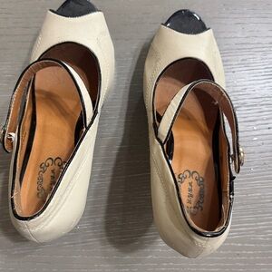 Groove Cream and Black Peep Toe Heels